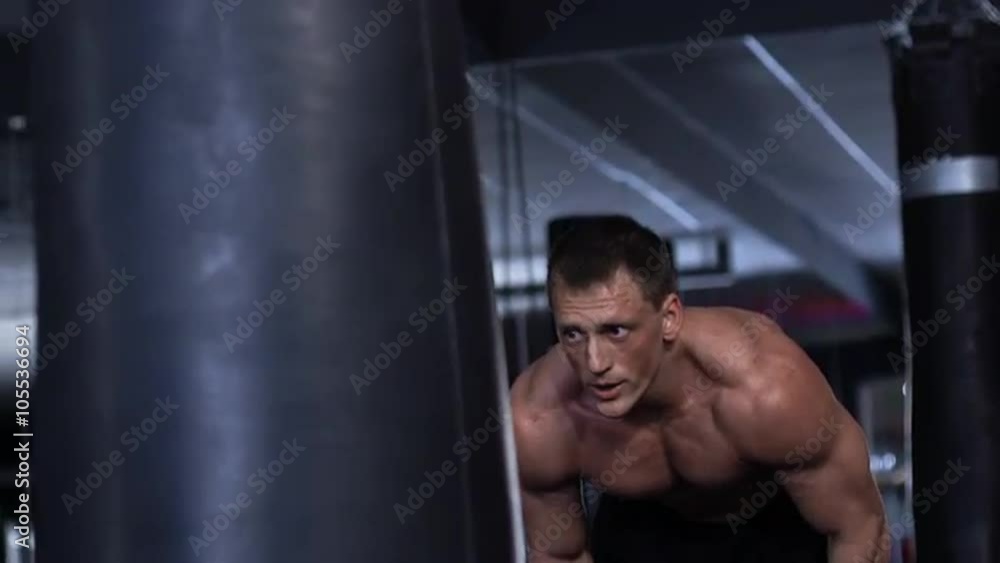 Handsome fit man boxing. Slow motion Handsome fit man boxing. Slow motion
