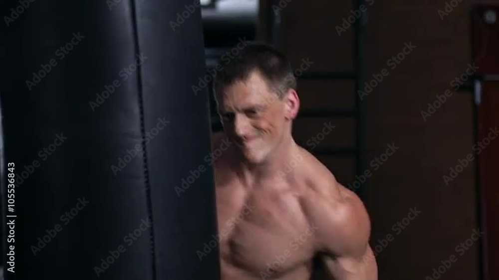 Handsome fit man boxing. Slow motion Handsome fit man boxing. Slow motion