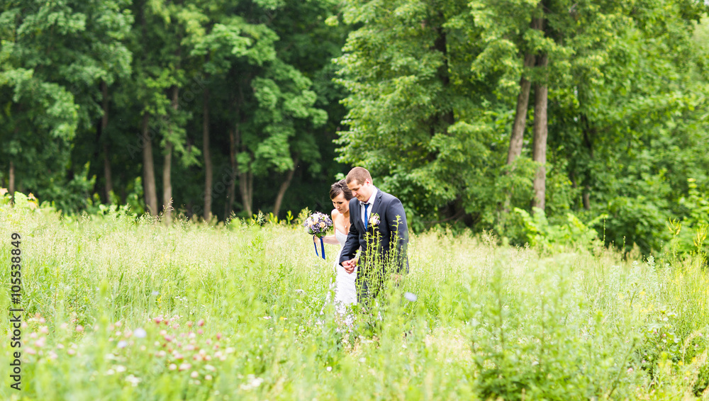 Fototapeta premium Happy bride and groom on their wedding day