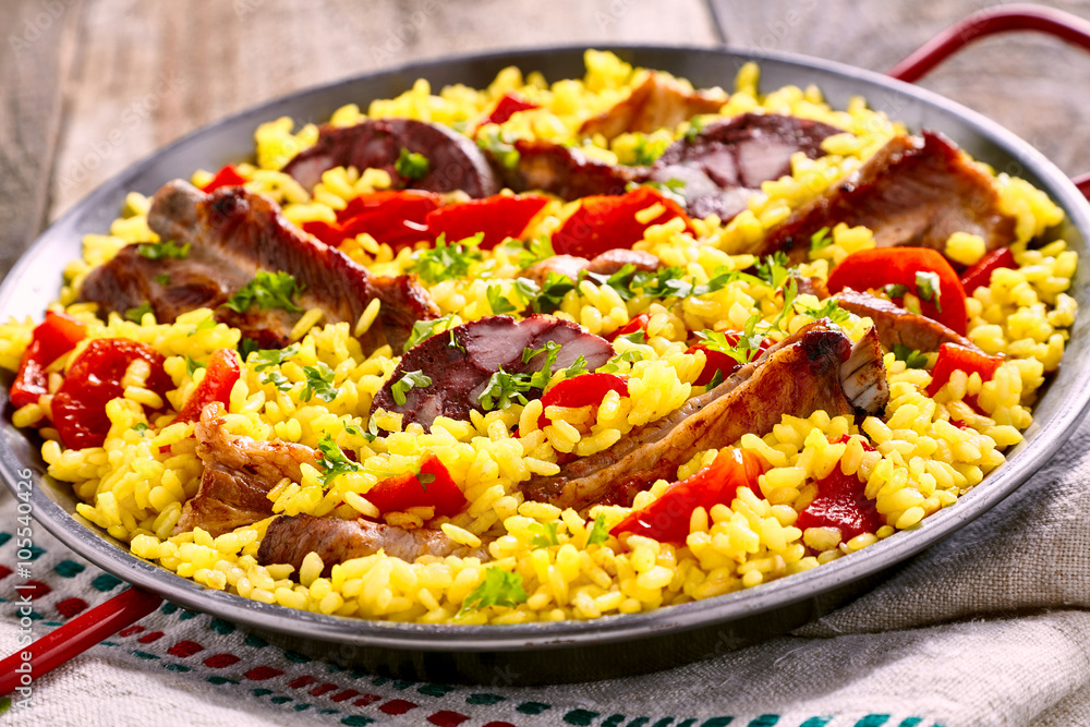 Serving of speciality Spanish Al Homo paella Serving of speciality Spanish Al Homo paella