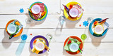 Colorful picnic table place settings