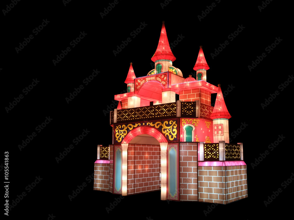 Colorful fabric lantern is built as antique castle, Isolated on black background.