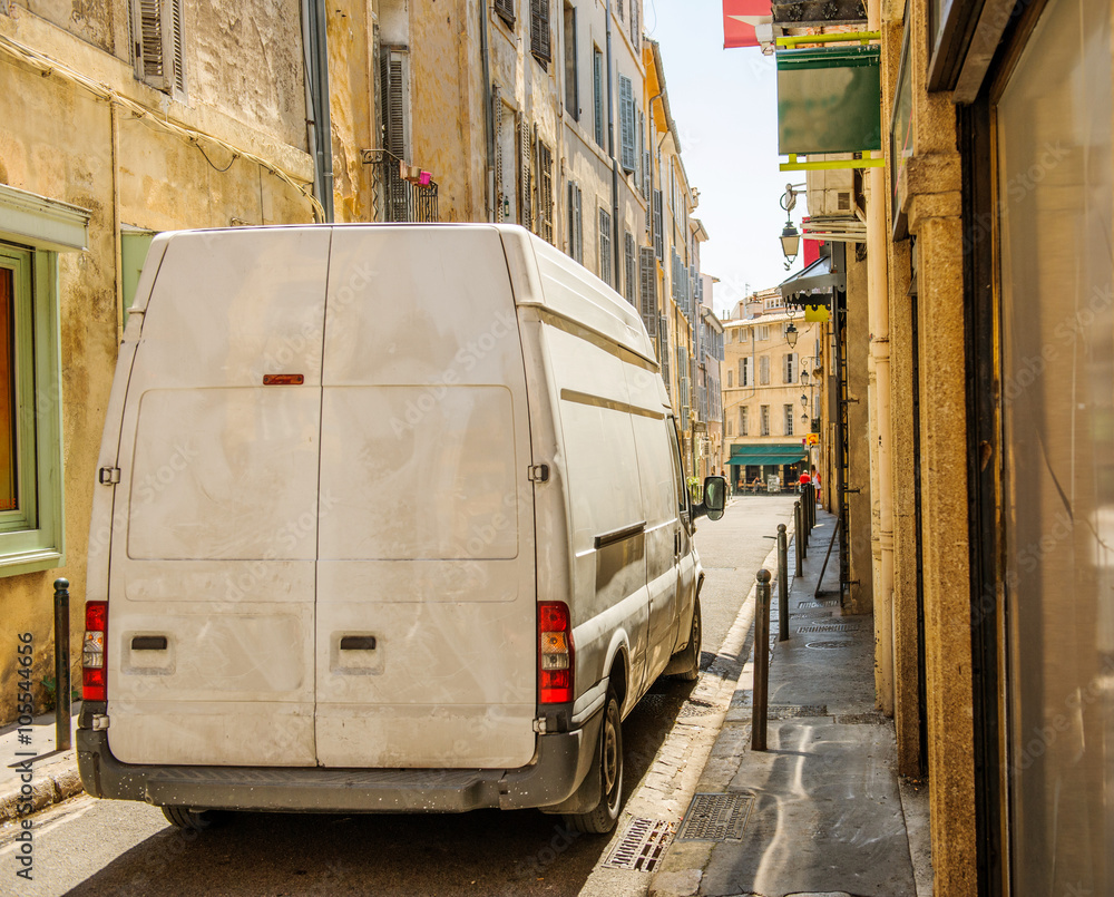 Dirty white delivery van on the narrow French streeto of the Aix En  Provence city in the Provence, France on a warm summer day Stock Photo |  Adobe Stock