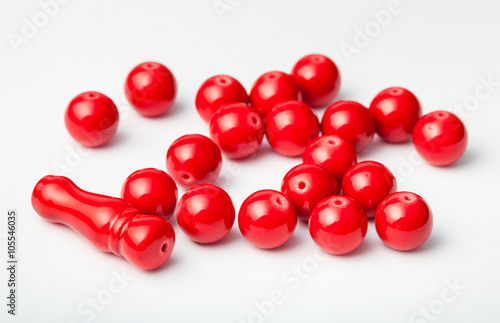 many red painted bone beads