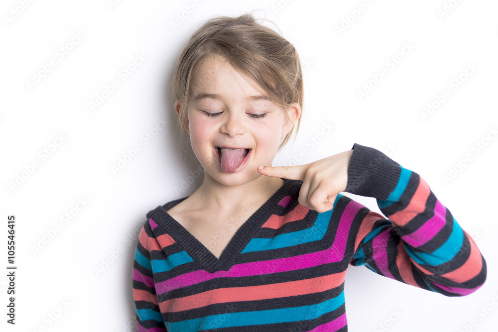 cute cheerful little girl portrait, isolated on gray background cute cheerful little girl portrait, isolated on gray background
