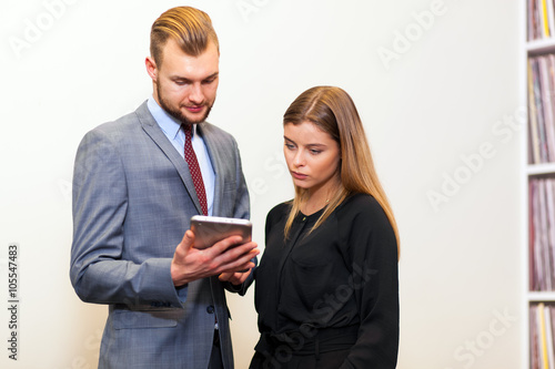 Young couple working in the office