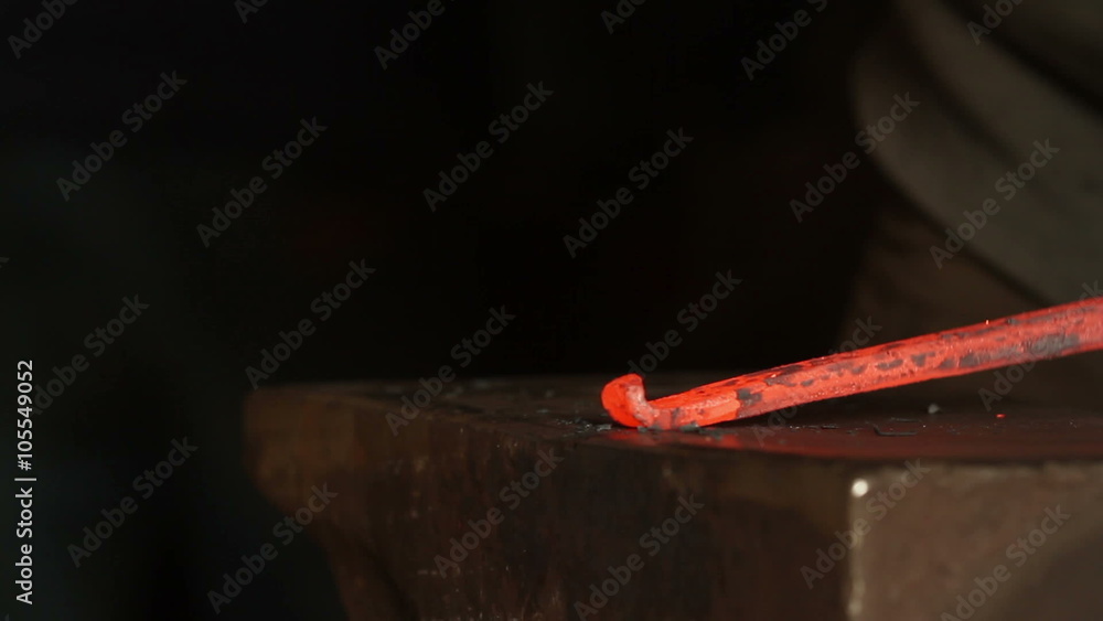 Forging hot metal in smithy, screwing, smashing Forging hot metal in smithy, screwing, smashing