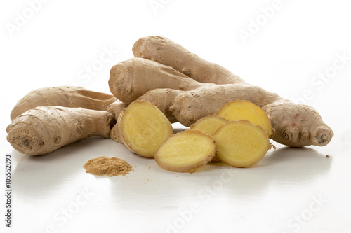 Ginger root and slices on white background