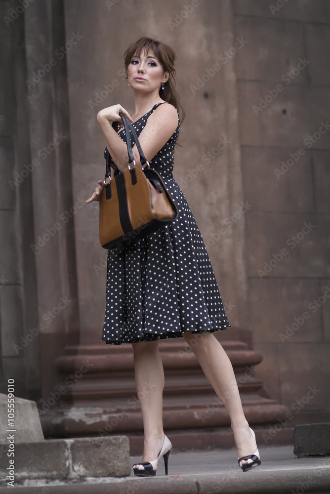Beautiful caucasian woman posing dressed in retro style Beautiful caucasian woman posing dressed in retro style