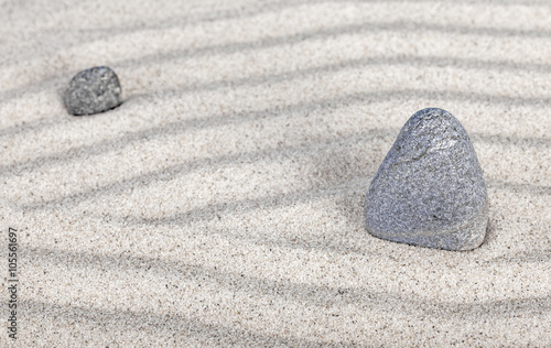 Canvas Print Two stones in sand, nature and harmony concept
