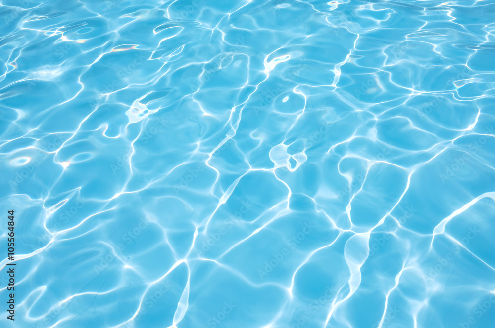 Fototapeta premium Beautiful blue water in swimming pool with sun reflection