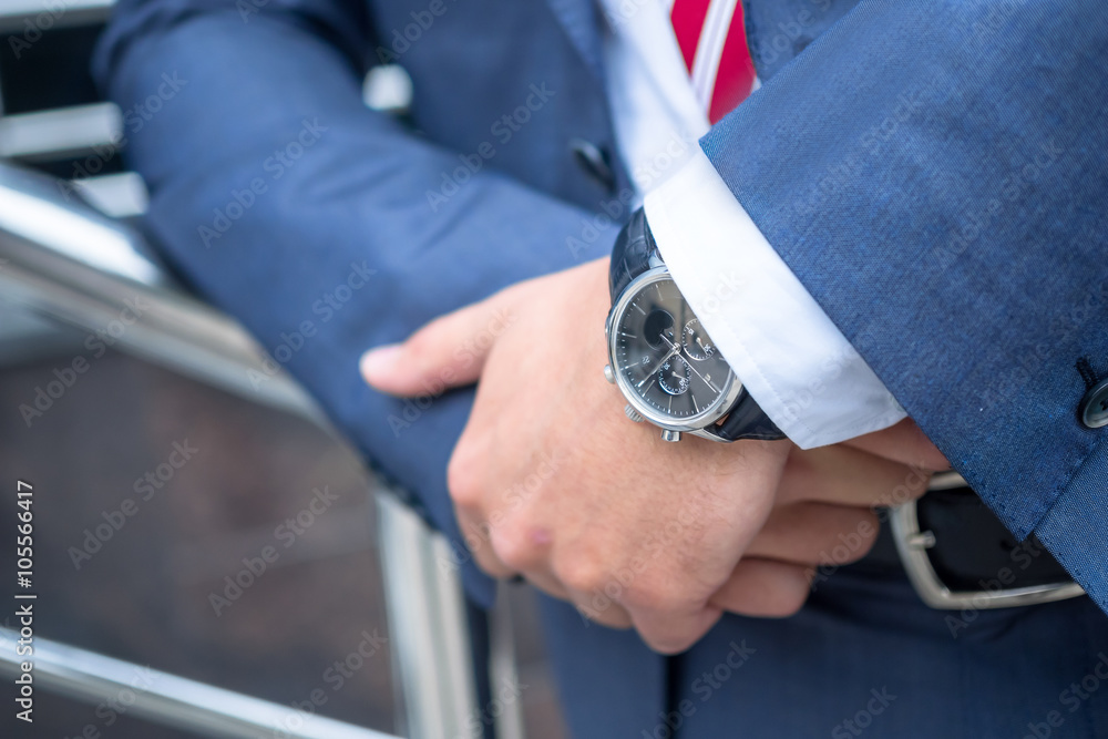 Fototapeta premium Close up shot of businessman hands with watshes