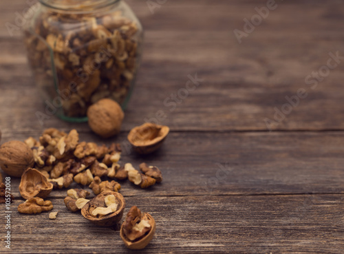 walnuts on rustic old wooden table