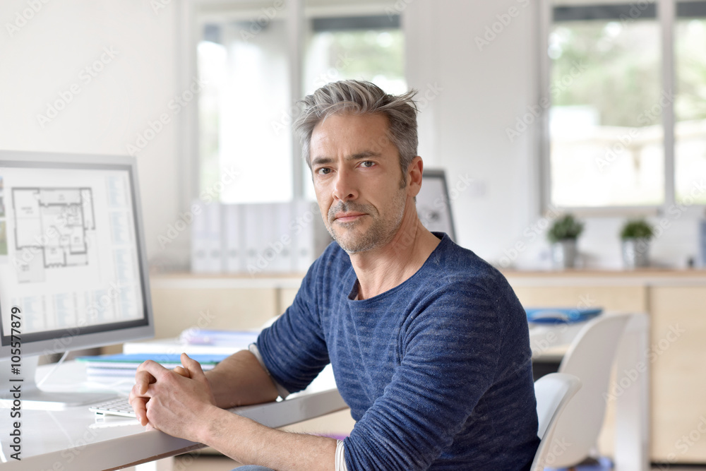 Portrait of mature businessman in office Portrait of mature businessman in office