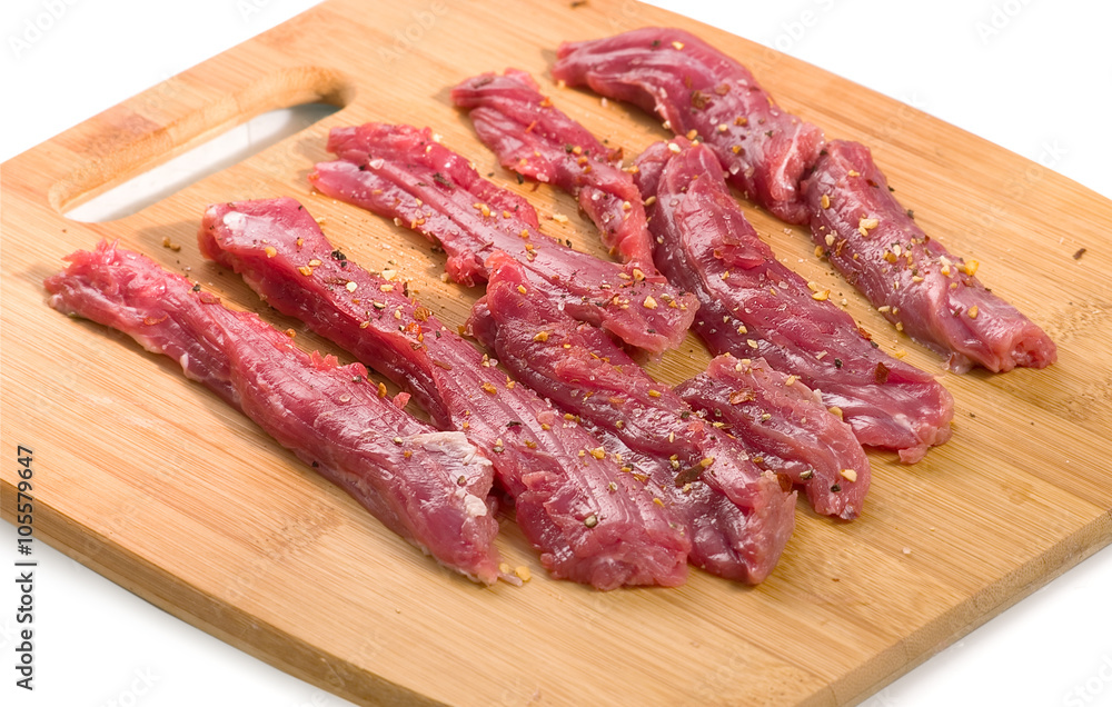 Raw meat on a white background Raw meat on a white background