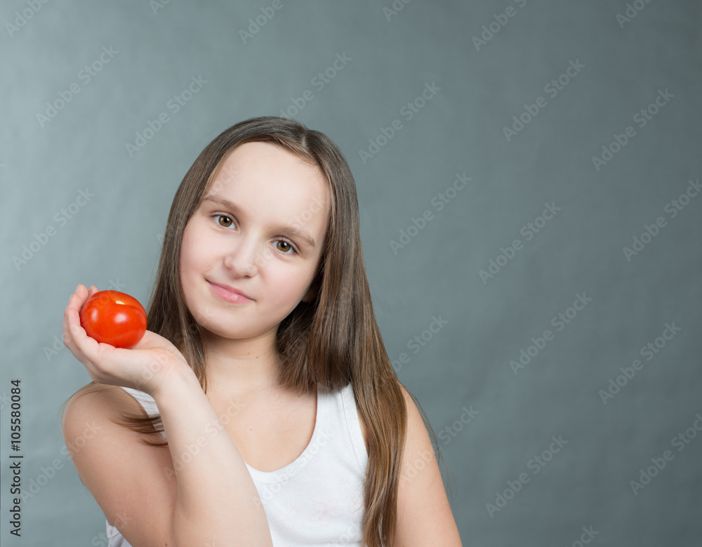 Girl with tomatoes in her hand Girl with tomatoes in her hand