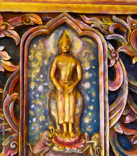 blurred Bhudha statue in Thai temple photo