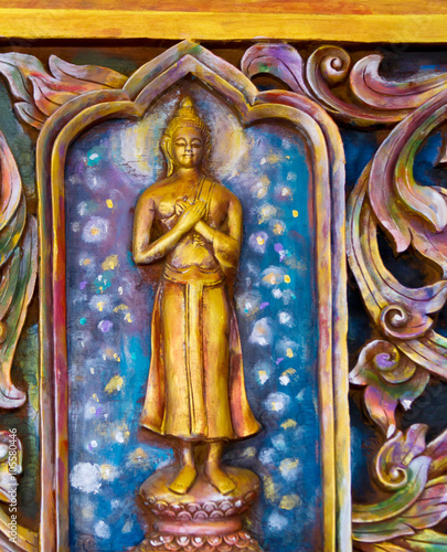 blurred Bhudha statue in Thai temple photo