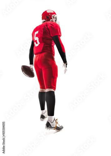 American football player posing with ball on white background © master1305