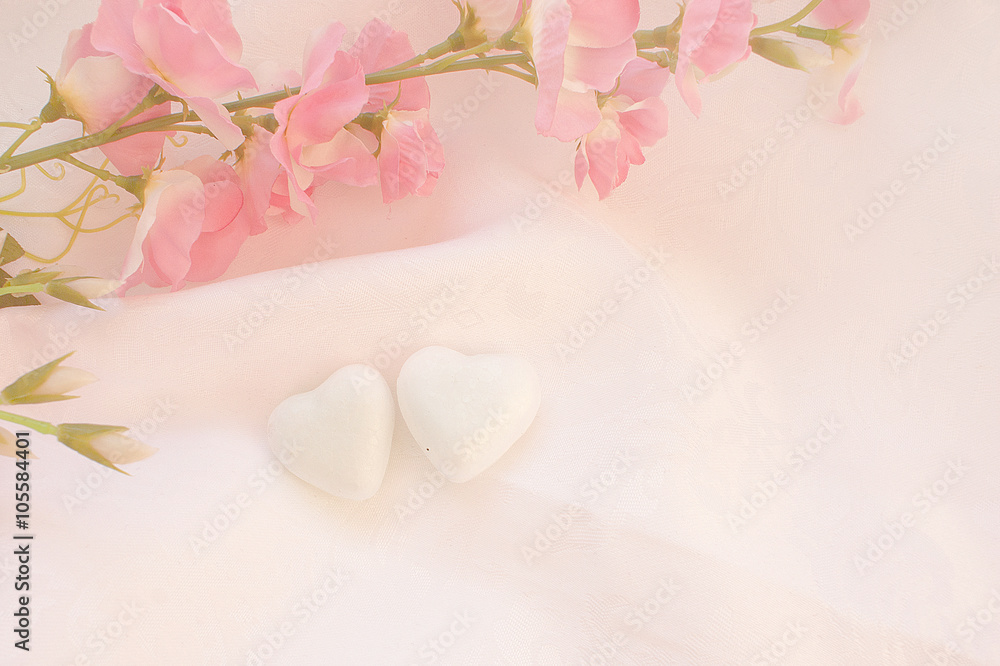 two white hearts on a pink background two white hearts on a pink background