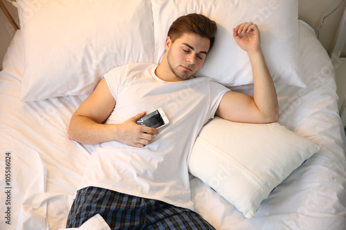 Young man sleeping with mob...