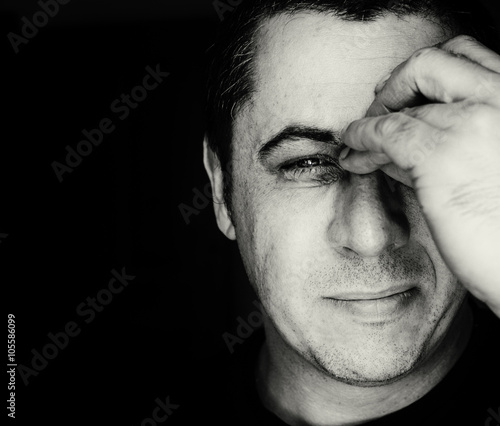 Man in Black and White with Head Ache Pain
