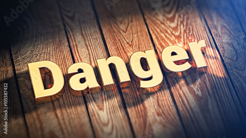 фотографія Word Danger on wood planks