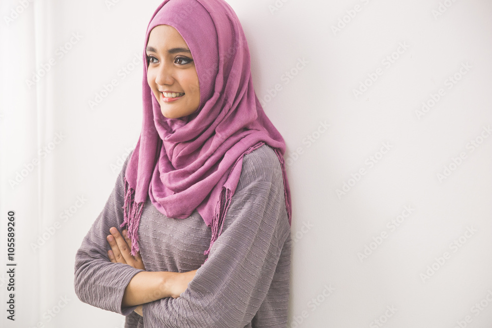 Young asian muslim woman in head scarf smile Young asian muslim woman in head scarf smile