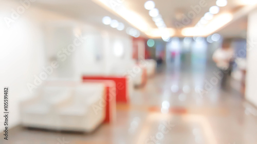 blur image of hospital office room with table and chairs