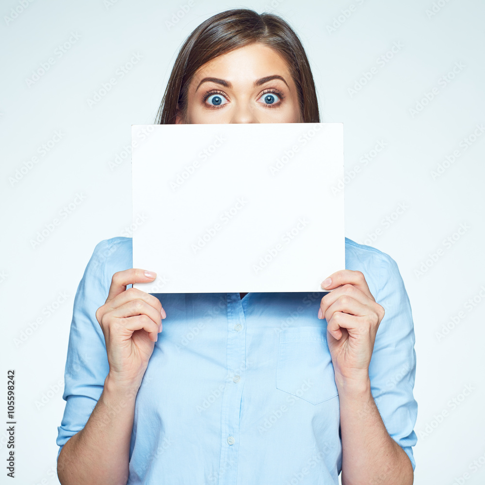 Scared business woman hide face with white sign board. Scared business woman hide face with white sign board.