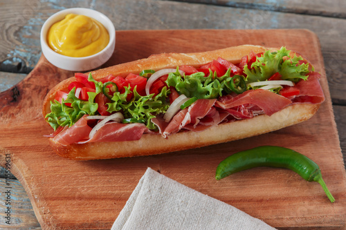  sandwich baguette ham jamon with tomato and herbs