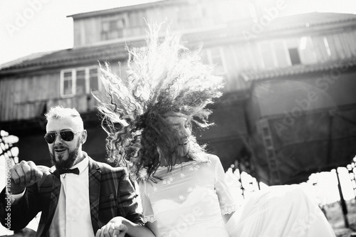 Sunlight is playing with the bride's hair