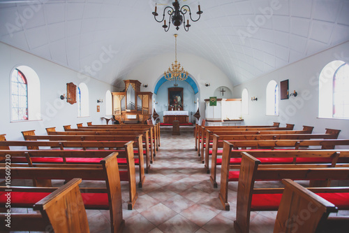 A classic catholic lutheran small church interior with no people inside