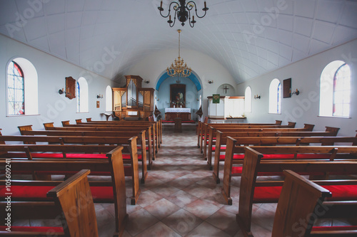 Slika na platnu A classic catholic lutheran small church interior with no people inside