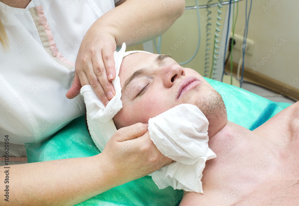man in the mask cosmetic procedure in spa salon man in the mask cosmetic procedure in spa salon
