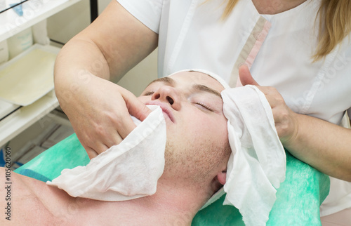 man in the mask cosmetic procedure in spa salon