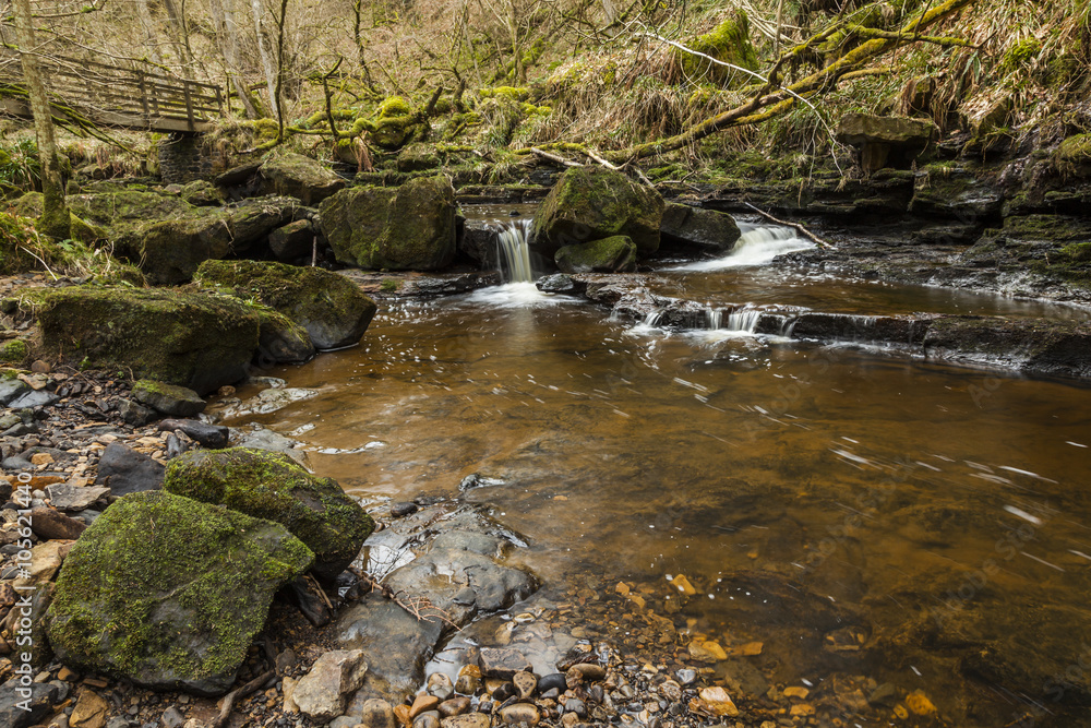Fototapeta premium Waterfall on Hareshaw Burn near Bellingham in the county of Northumberland, England, UK.