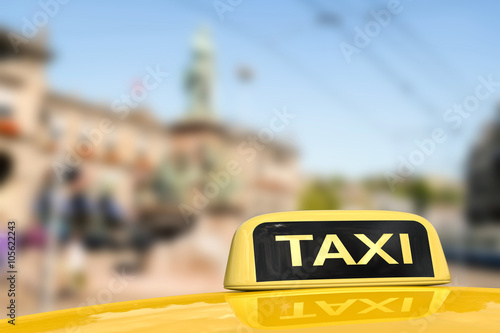taxi for traveling with cityscape background