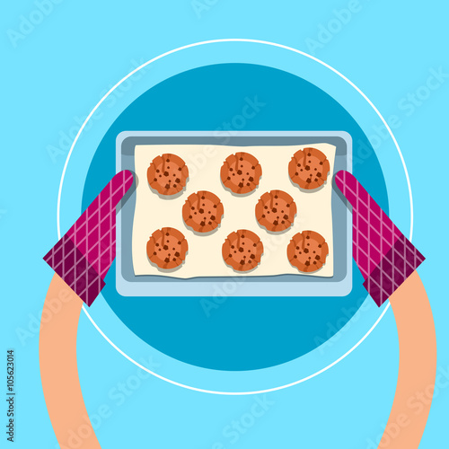 Hands In Kitchen Gloves Holding Tray With Cakes Biscuits Cupcakes Sweet Bakery Top Angle View