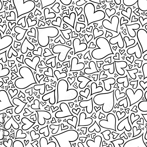 Seamless pattern with hand drawn monochrome hearts in zentangle