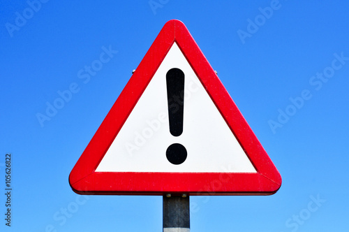 triangular traffic sign with an exclamation mark