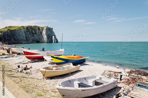 Boats on the beach at the cliffs of Etretat © jjfarq