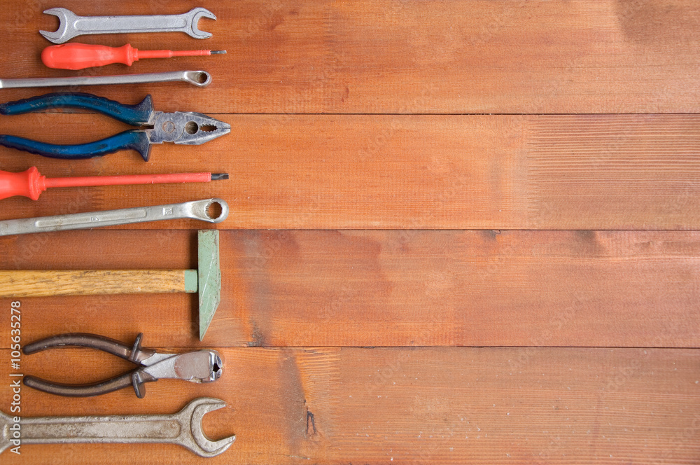 Tools on a wooden floor Tools on a wooden floor