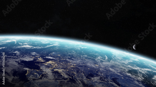 Fototapeta samoprzylepna Wschód słońca nad planetą Ziemią w kosmosie