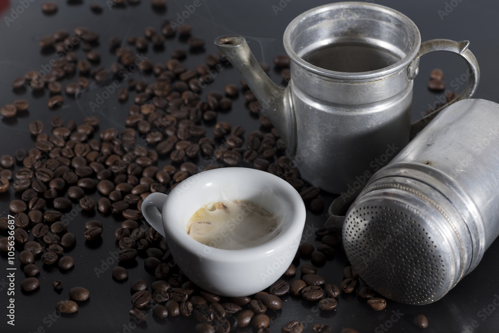 white cup with old Neapolitan coffee on white background white cup with old Neapolitan coffee on white background