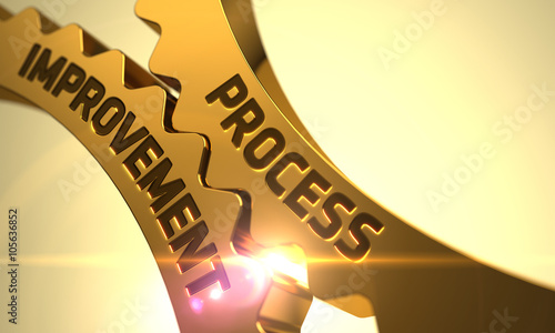 Process Improvement on Mechanism of Golden Cogwheels with Lens Flare. Process Improvement on Mechanism of Golden Metallic Gears. Process Improvement on the Golden Cog Gears. 3D. photo