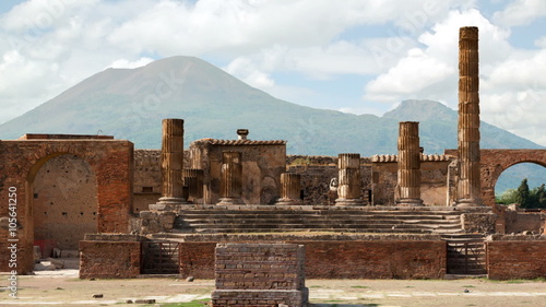 Timelapse of the ruins of Pompei with volcano Vesuvius at back in Italy