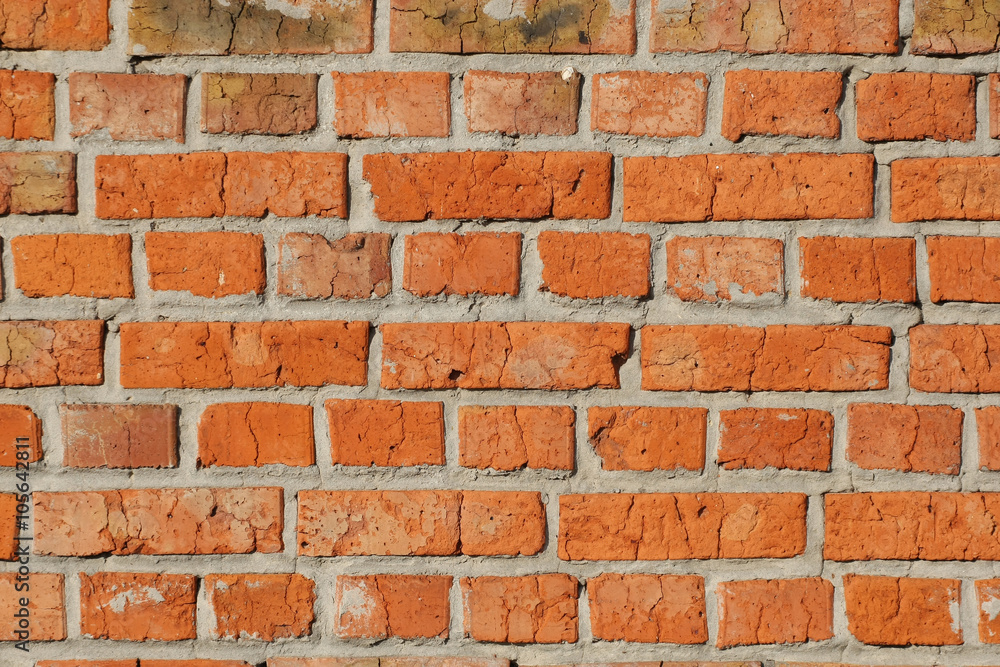 old red brick wall close up.