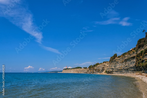 shore line with lighthouse