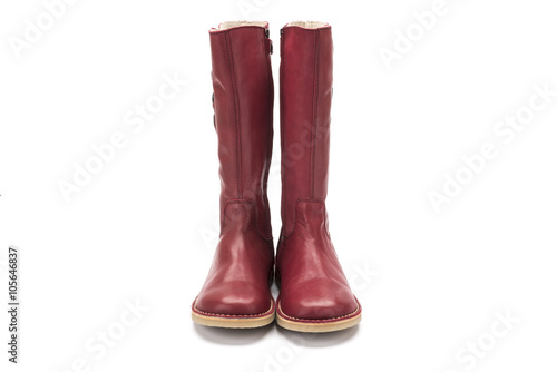 red childrens leather boot on a white background